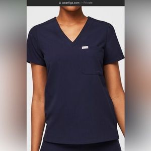 NWT still in packaging Navy Blue Catarina One Pocket Figs Scrub Top.